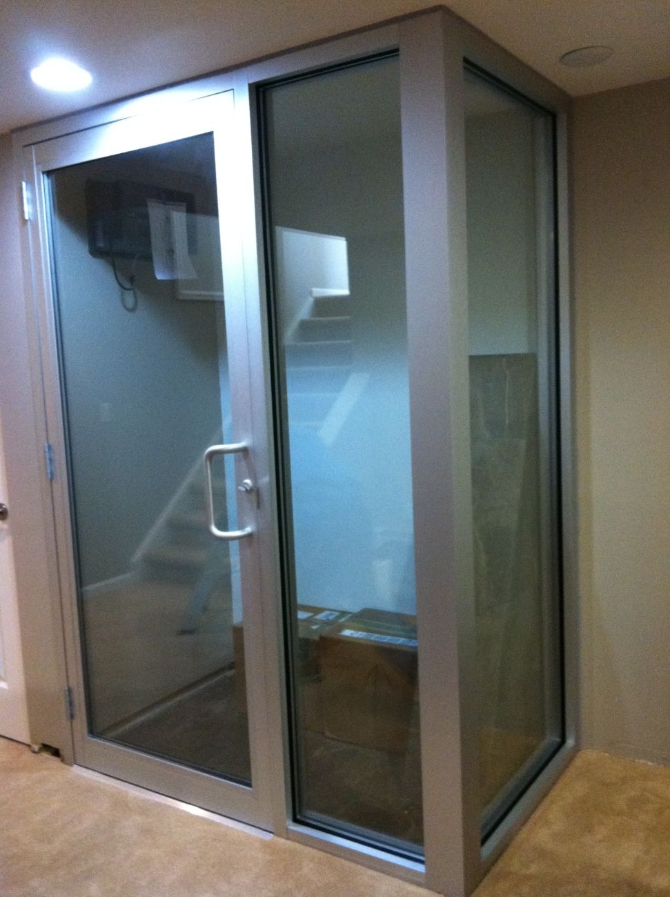 Aluminum-framed glass door and sidelite installation