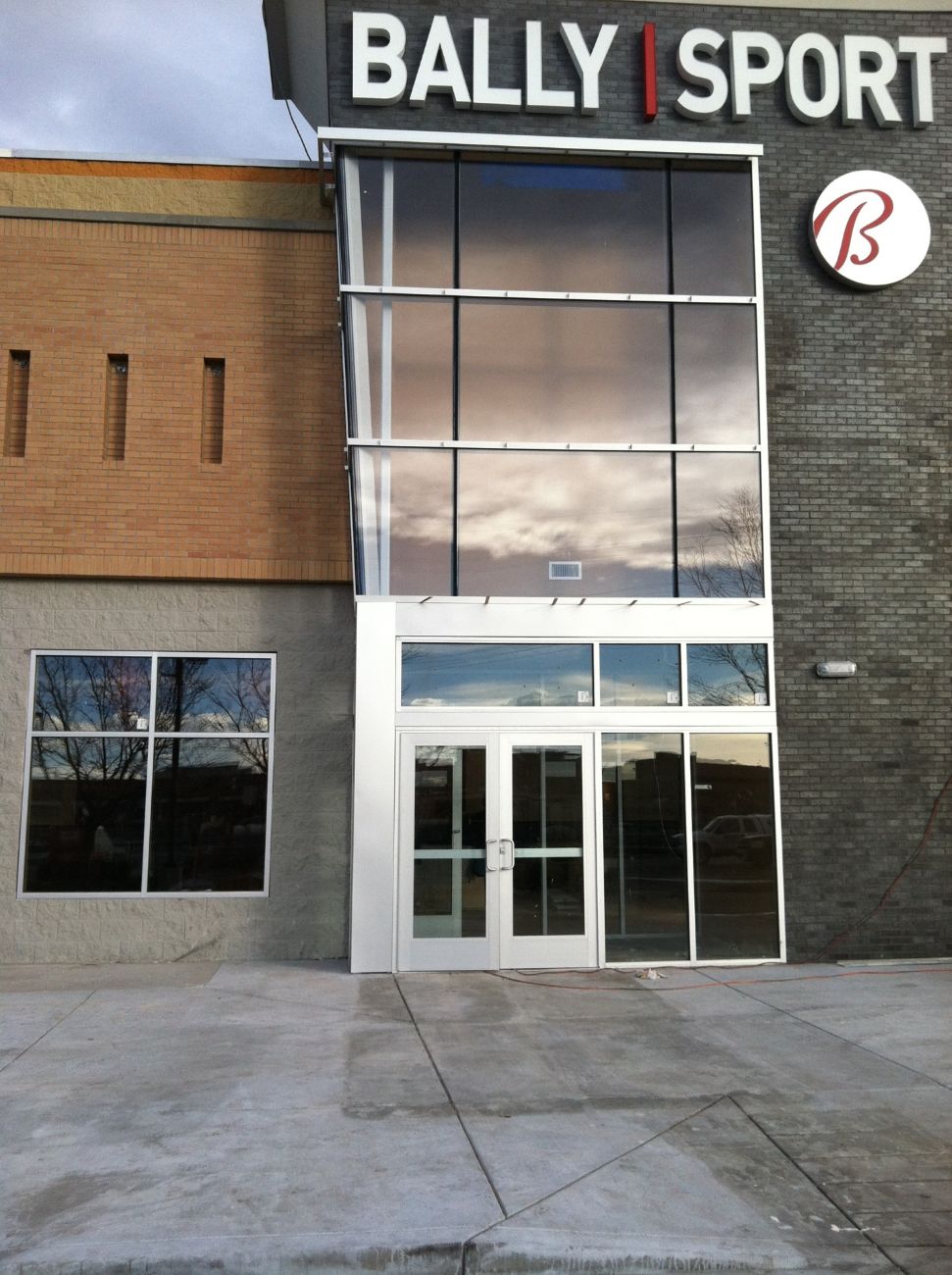 Glass storefront entrance and curtain wall
