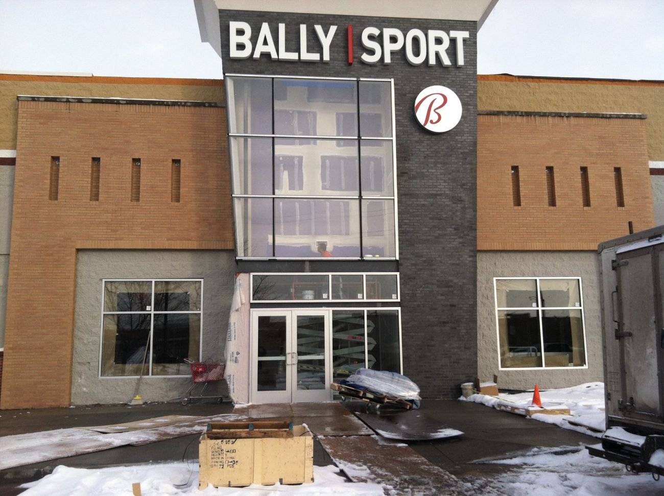Glass storefront and curtain wall installed in winter